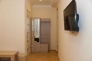 TV a/nebo společenská místnost v ubytování Holiday Rooms