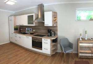 Dapur atau dapur kecil di Strandhaus Seeperle