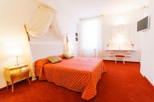 מיטה או מיטות בחדר ב-Villa Marini Trevisan