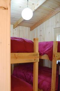 Poschodová posteľ alebo postele v izbe v ubytovaní Centro Ecuestre Hipomedano