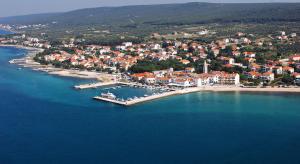 an aerial view of a resort in the water at Apartman Nina in Turanj