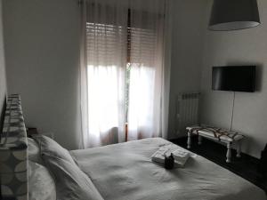 Postel nebo postele na pokoji v ubytování Style di Elisabetta Notari
