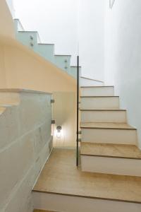 a staircase in a house with a stair case at Amelie in Rabat
