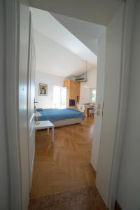 Ένα ή περισσότερα κρεβάτια σε δωμάτιο στο Paradise with Sea View Apartment