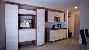 Kuchyň nebo kuchyňský kout v ubytování Irány Colorado Apartman