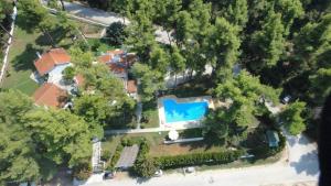 an aerial view of a house with a swimming pool at Nirvana house in Sani Beach