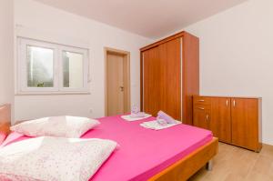 Posteľ alebo postele v izbe v ubytovaní Apartment Ivo