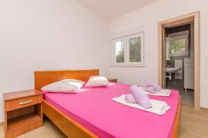 Posteľ alebo postele v izbe v ubytovaní Apartment Ivo