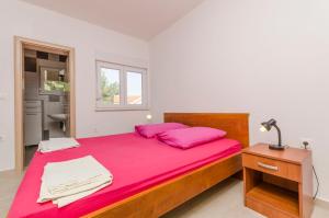 Posteľ alebo postele v izbe v ubytovaní Apartment Ivo
