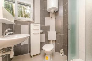 Kúpeľňa v ubytovaní Apartment Ivo + 28 fotografií