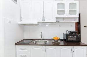 Küche/Küchenzeile in der Unterkunft Apartments Napoli
