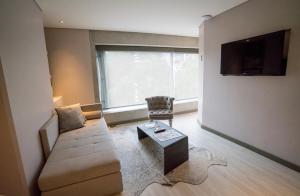 TV a/nebo společenská místnost v ubytování Hotel CityFlats