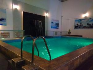 Bazén v ubytování Libertad Hotel nebo v jeho okolí