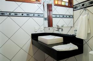 Phòng tắm tại Refron du Mar Pousada Paraty