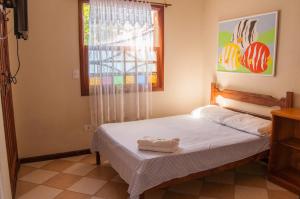 Postel nebo postele na pokoji v ubytování Refron du Mar Pousada Paraty