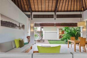 Гостиная зона в Pradha Villas Seminyak