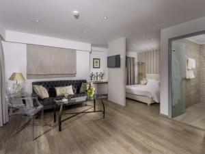 Postel nebo postele na pokoji v ubytování Elite Hotel