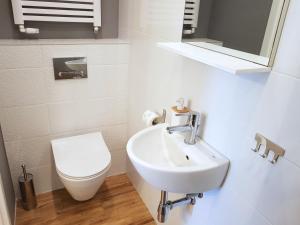 Kúpeľňa v ubytovaní Apartamenty METRO Targówek + 21 fotografií