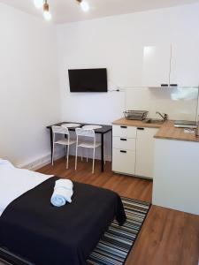 Kuchyňa alebo kuchynka v ubytovaní Apartamenty METRO Targówek