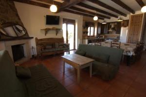 A seating area at Casas Rurales Lalo y Chelo