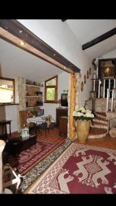 Posezení v ubytování Rooms Romangia