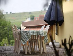 Rõdu või terrass majutusasutuses La maison du Vignoble
