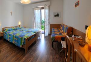 Postel nebo postele na pokoji v ubytování Villa Flora