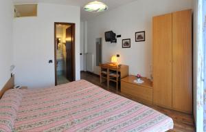 Postel nebo postele na pokoji v ubytování Villa Flora