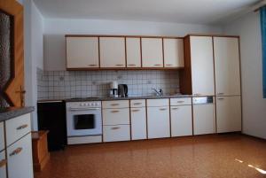Kuchyň nebo kuchyňský kout v ubytování Apartment Maierhof