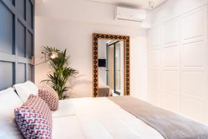 Posteľ alebo postele v izbe v ubytovaní Blue Island Luxury Apartment