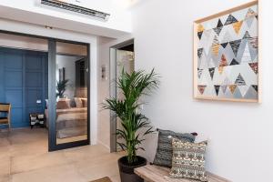 Posedenie v ubytovaní Blue Island Luxury Apartment