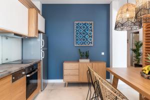 Kuchyňa alebo kuchynka v ubytovaní Blue Island Luxury Apartment