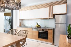 Kuchyňa alebo kuchynka v ubytovaní Blue Island Luxury Apartment