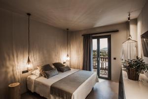Postel nebo postele na pokoji v ubytování Doryssa Boutique Hotel