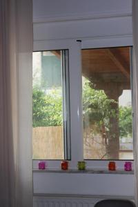 Fotografie z fotogalerie ubytování Cozy Backyard House v destinaci Pláka