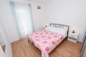 Łóżko lub łóżka w pokoju w obiekcie Apartments Palaziol