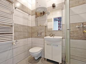 Kúpeľňa v ubytovaní Apartament Starogdański 51