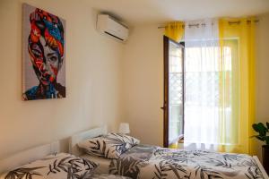 Posteľ alebo postele v izbe v ubytovaní Apartment Kaya