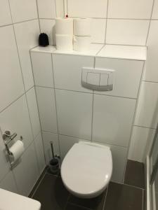 Koupelna v ubytování Haus-Deichläufer + 14 fotografií