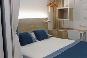 Кровать или кровати в номере Rocatel
