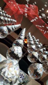 a row of wine glasses lined up on a table at Luxury 3 Bedroom Penthouse With Private Garage in Braga