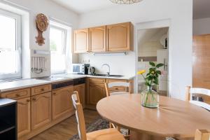 Kuchyňa alebo kuchynka v ubytovaní Apartmány Fojtova studna