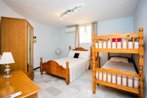 Postel nebo postele na pokoji v ubytování Villa Kathleen