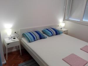 Posteľ alebo postele v izbe v ubytovaní Šareni
