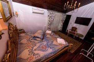 Postel nebo postele na pokoji v ubytování Casa Andrei + 37 fotografií
