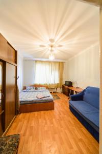 Кровать или кровати в номере Квартира по адресу ул. Черняховского 12