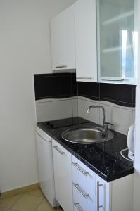 Kuchyň nebo kuchyňský kout v ubytování Apartment Čirko