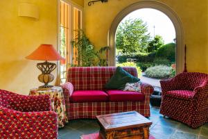 Posezení v ubytování Hostellerie Du Golf