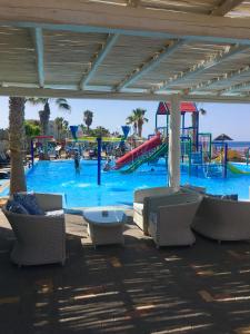 a large water park with a playground with slides at Rossi apartment in Hersonissos