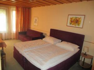 Łóżko lub łóżka w pokoju w obiekcie Pension Wachau
